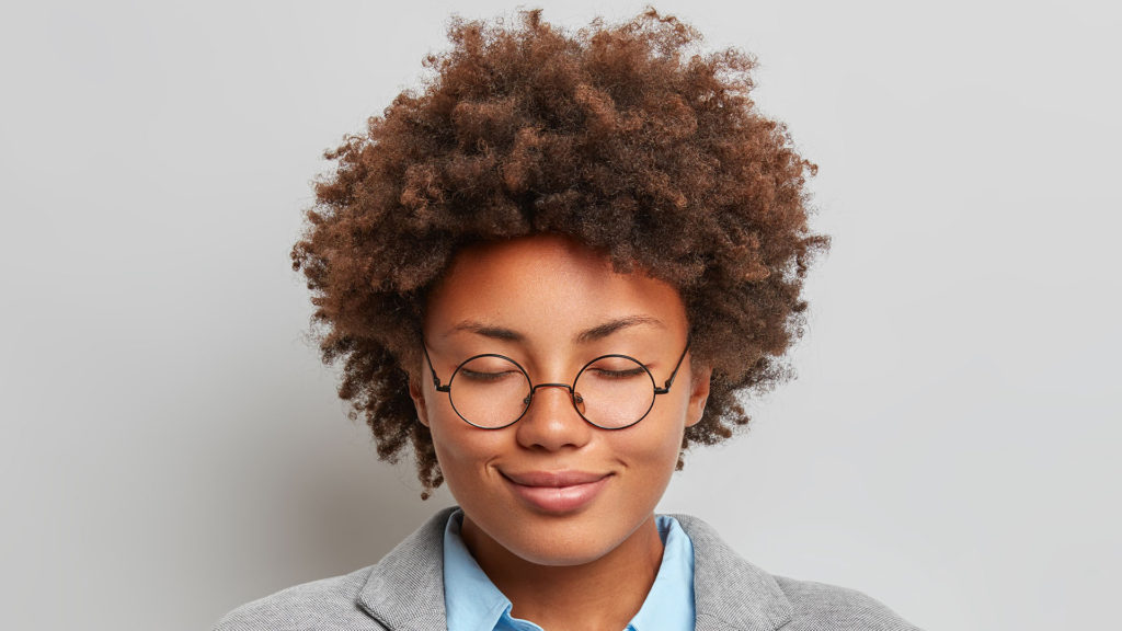 A black woman smiling