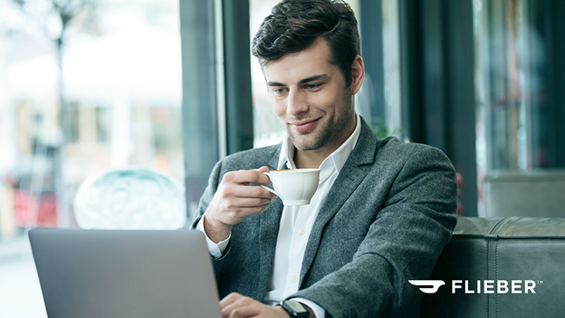 man sitting in front of a computer